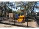 playground with climbing structures and slides at 37715 Aaralyn Rd, Zephyrhills, FL 33542