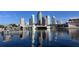 Tampa skyline reflecting on calm river waters at 408 E Amelia Ave, Tampa, FL 33602