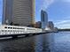 Tampa city skyline with modern highrises and waterfront walkway at 408 E Amelia Ave, Tampa, FL 33602