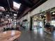 Indoor food hall with communal tables and seating at 408 E Amelia Ave, Tampa, FL 33602