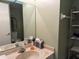 Clean bathroom with double vanity and a large mirror at 4908 38Th S Way # 504, St Petersburg, FL 33711