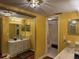 Bright bathroom with double sinks and separate tub at 4908 38Th S Way # 504, St Petersburg, FL 33711
