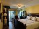 Spacious main bedroom with king-size bed and wood furniture at 4908 38Th S Way # 504, St Petersburg, FL 33711