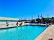 Inviting community pool with lounge chairs at 4908 38Th S Way # 504, St Petersburg, FL 33711