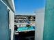 View of a community pool and marina with numerous boats at 4908 38Th S Way # 504, St Petersburg, FL 33711