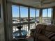 Sunroom with marina views and comfortable seating at 4908 38Th S Way # 504, St Petersburg, FL 33711