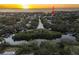 Aerial view highlighting waterfront location and canal at 5004 W Leona St, Tampa, FL 33629