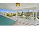 Balcony view overlooking lush greenery and a serene waterway at 5004 W Leona St, Tampa, FL 33629