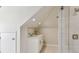 Small bathroom with white vanity and a glass shower at 5004 W Leona St, Tampa, FL 33629