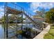 Boat lift offers convenient waterfront access and storage at 5004 W Leona St, Tampa, FL 33629