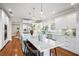 Kitchen showcasing an island with seating and stainless steel appliances, perfect for modern living and entertaining at 5004 W Leona St, Tampa, FL 33629