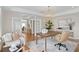 Bright office space with French doors, stylish decor, and comfortable seating creates a productive work environment at 5004 W Leona St, Tampa, FL 33629