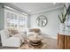 Cozy sitting room featuring comfortable seating, neutral colors, and decorative accents at 5004 W Leona St, Tampa, FL 33629