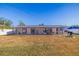 Serene backyard oasis with covered patio and ample space at 5201 40Th S St, St Petersburg, FL 33711