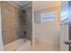 Charming bathroom with updated bathtub and tile at 5201 40Th S St, St Petersburg, FL 33711