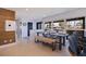 Open concept dining area with farmhouse table and kitchen view at 5201 40Th S St, St Petersburg, FL 33711