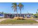 Mid-century modern home with a sleek design and landscaping at 5201 40Th S St, St Petersburg, FL 33711