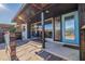 Inviting front porch with blue door and modern landscaping at 5201 40Th S St, St Petersburg, FL 33711