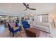 Open concept living room with comfy seating and kitchen views at 5201 40Th S St, St Petersburg, FL 33711