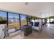 Relaxing screened porch with fire pit and outdoor seating at 5201 40Th S St, St Petersburg, FL 33711