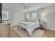 Comfortable bedroom with a queen-size bed and light decor at 6001 Leeland S St, St Petersburg, FL 33715