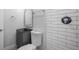 Stylish bathroom with gray vanity and subway tile shower at 670 16Th S Ave, St Petersburg, FL 33701