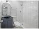 Updated bathroom, featuring a walk-in shower with subway tile at 670 16Th S Ave, St Petersburg, FL 33701