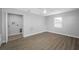 Spacious bedroom with new flooring and ceiling fan at 670 16Th S Ave, St Petersburg, FL 33701