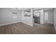Open concept dining area with new flooring and kitchen access at 670 16Th S Ave, St Petersburg, FL 33701