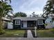 Charming bungalow with modern exterior, walkway, and landscaping at 670 16Th S Ave, St Petersburg, FL 33701