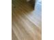 Newly installed light brown wood-look vinyl plank flooring at 670 16Th S Ave, St Petersburg, FL 33701