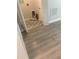 Newly installed light brown wood-look vinyl plank flooring at 670 16Th S Ave, St Petersburg, FL 33701