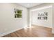 Spacious bedroom with hardwood floors and large windows at 712 E Madison St, Plant City, FL 33563