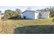 Back of house showing exterior and yard at 712 E Madison St, Plant City, FL 33563