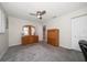 Spacious bedroom with neutral carpeting and ample closet space at 8970 Park Blvd # B, Seminole, FL 33777