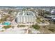 Aerial view of resort, pools, and beach access at 12000 Gulf Blvd # 208-S, Treasure Island, FL 33706