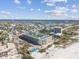 Aerial view of resort, pool, and beach at 12000 Gulf Blvd # 208-S, Treasure Island, FL 33706
