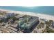 Aerial view of resort near beach at 12000 Gulf Blvd # 208-S, Treasure Island, FL 33706