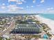 Aerial view of resort, beach, and city at 12000 Gulf Blvd # 208-S, Treasure Island, FL 33706