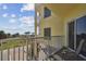 Beachfront balcony view with patio furniture at 12000 Gulf Blvd # 208-S, Treasure Island, FL 33706