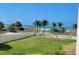 Oceanfront view from condo with lush landscaping and boardwalk access at 12000 Gulf Blvd # 208-S, Treasure Island, FL 33706