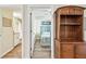 View into bedroom with queen-size bed and wood flooring at 12000 Gulf Blvd # 208-S, Treasure Island, FL 33706