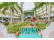 Relaxing courtyard with tropical landscaping at 12000 Gulf Blvd # 208-S, Treasure Island, FL 33706
