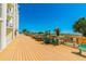 Community deck overlooking the ocean with seating at 12000 Gulf Blvd # 208-S, Treasure Island, FL 33706