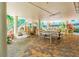 Under-building game room with ping pong offers recreation and shade from the sun at 12000 Gulf Blvd # 208-S, Treasure Island, FL 33706
