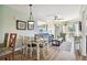 Bright living room with modern decor, dining area, and comfortable seating at 12000 Gulf Blvd # 208-S, Treasure Island, FL 33706