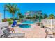 Large and small pools with lounge chairs and hot tub at 12000 Gulf Blvd # 208-S, Treasure Island, FL 33706
