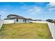 Large backyard with grassy area and privacy fence at 12783 Maple Bonsai Dr, Riverview, FL 33579