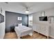 Spacious bedroom with white dresser and a modern feel at 12783 Maple Bonsai Dr, Riverview, FL 33579