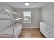 Light bedroom with house-shaped bed and white dresser at 12783 Maple Bonsai Dr, Riverview, FL 33579